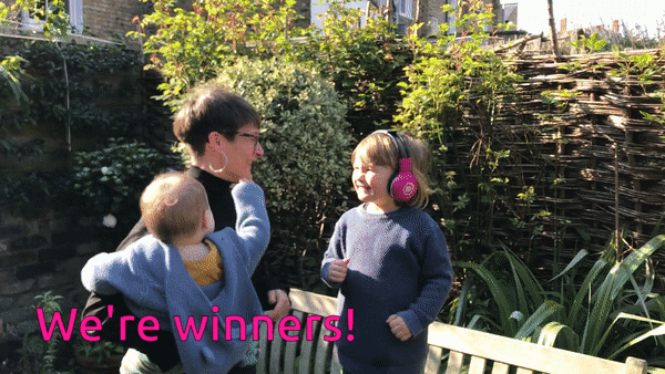 Director Tilly celebrating now>press>play winning Best Primary Resource (inc. ICT) in the Educational Resources Awards 2020, with her two children.