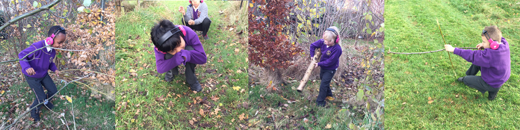 Students from Whitefield Primary School use Now Press Play while outdoors. They're exploring the environment around them while listening through pink headphones.