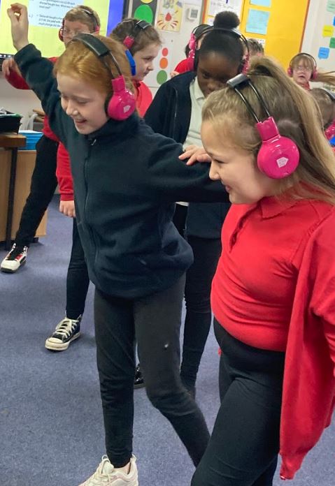 Two Chiltern school students enjoy using Now Press Play together