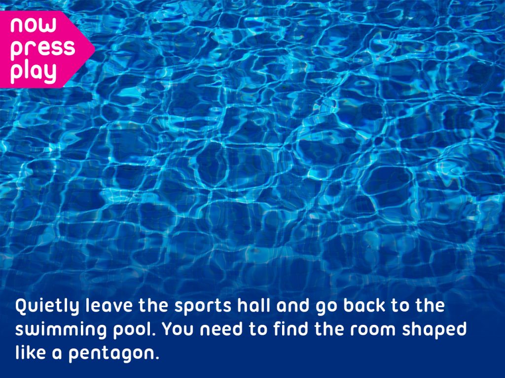 Water ripples in a swimming pool, from Now Press Play's SATs Maths Experience. Caption: Quietly leave the sports hall and go back to the swimming pool. You need to find the room shaped like a pentagon.