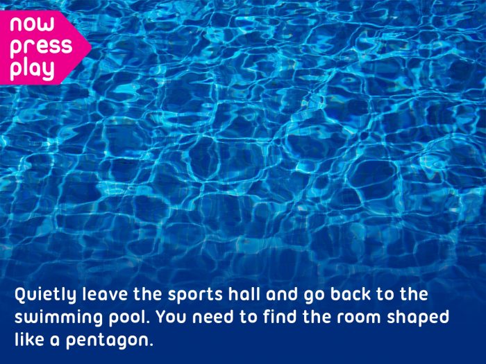 Water ripples in a swimming pool, from Now Press Play's SATs Maths Experience. Caption: Quietly leave the sports hall and go back to the swimming pool. You need to find the room shaped like a pentagon.