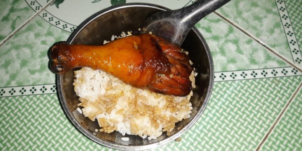 A plate of chicken and rice