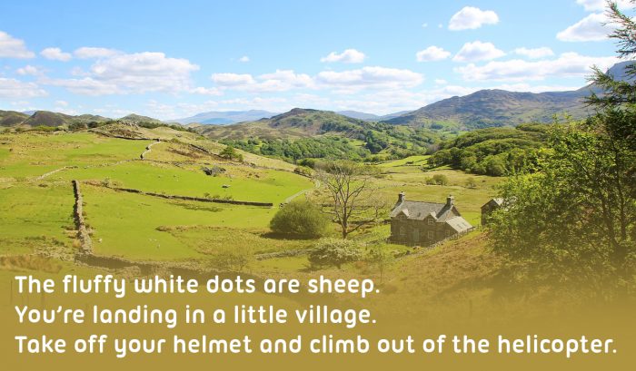 Snowdonia in Wales to illustrate the differences between different countries in the UK, text reads 'The fluffy white dots are sheep. You’re landing in a little village. Take off your helmet and climb out of the helicopter.'
