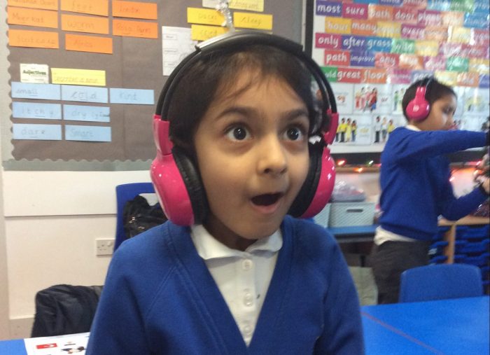 A child looking shocked while using Now Press Play