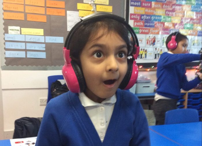 A child looking shocked while using Now Press Play